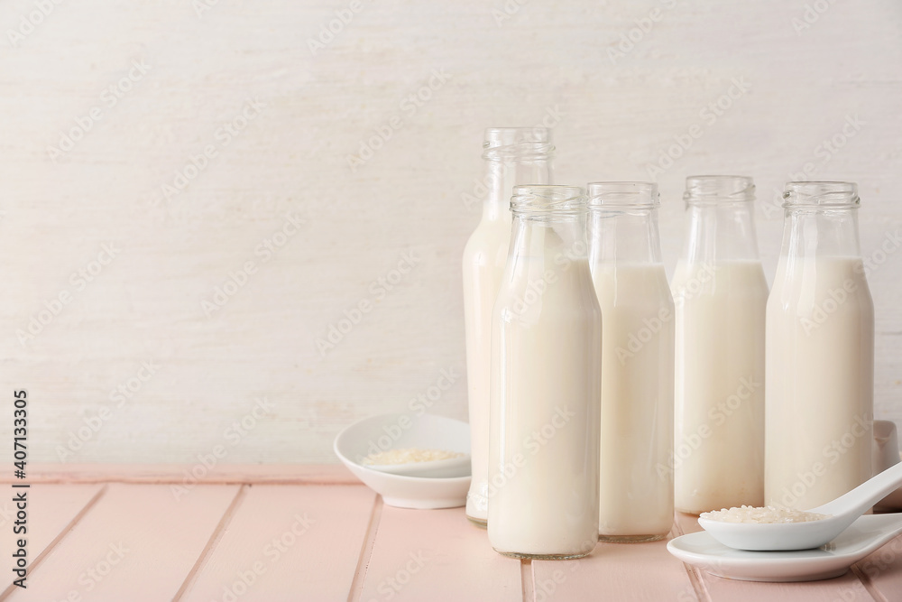 Bottles of rice milk on table