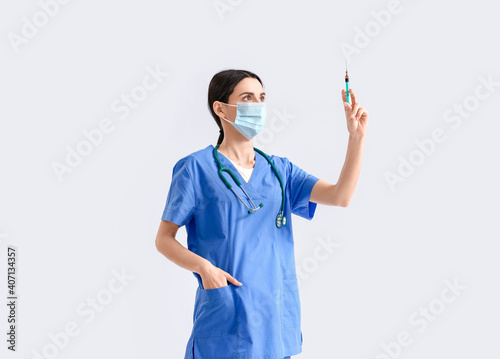 Portrait of female doctor w...