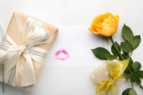 Festive composition with empty card and gifts on white background