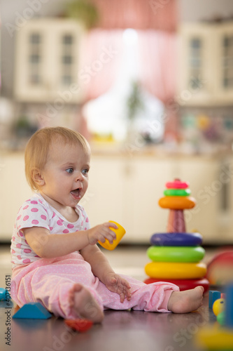 Baby one year old plays