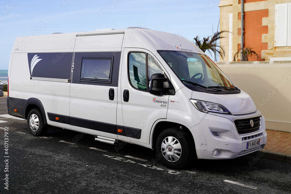 Fiat ducato Rapido RV holiday trip in motorhome Caravan car Vacation with camper van parked in city Stock Adobe Stock