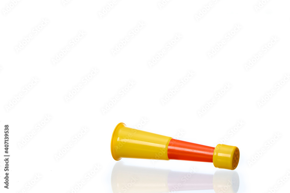 Vuvuzela trumpet Yellow cheer on a white Vuvuzela trumpet Yellow cheer on a white