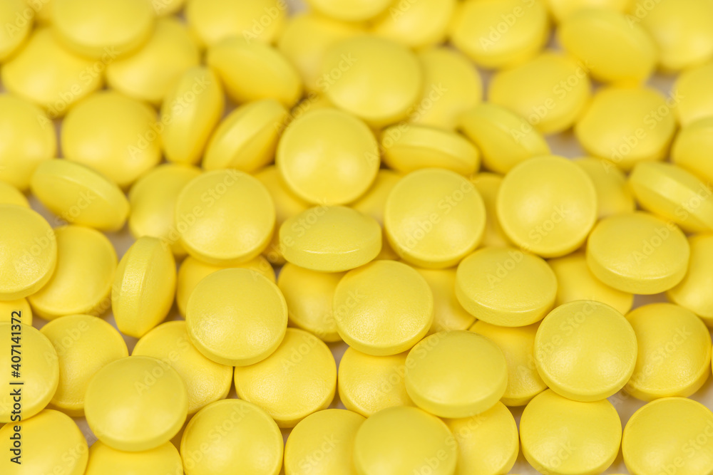 Medicine background of yellow painkillers Medicine background of yellow painkillers