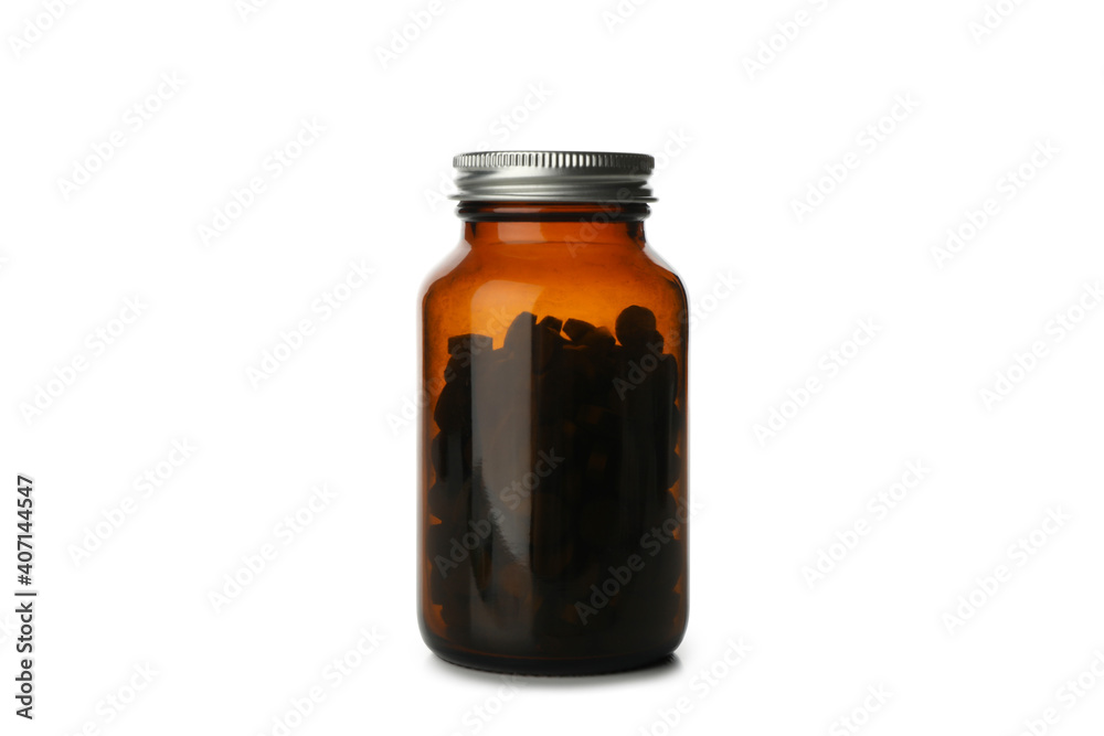 Medical bottle with spirulina pills isolated on white background Medical bottle with spirulina pills isolated on white background