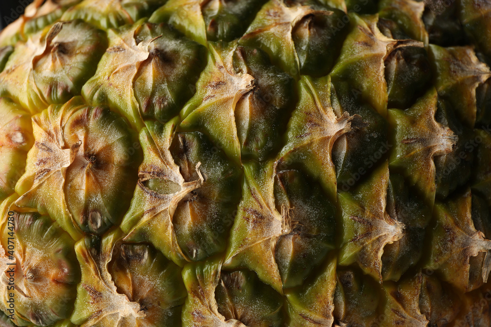 Texture of ripe pineapple skin, close up