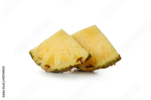 Ripe pineapple slices isolated on white background