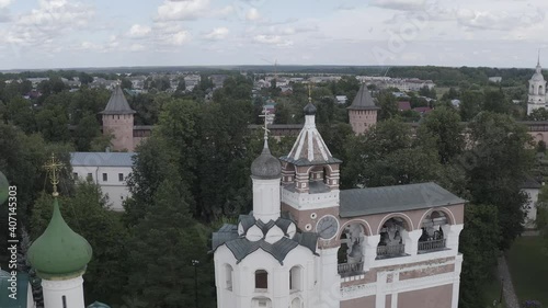 D-Log. Suzdal, Russia. Flight. The Saviour Monastery of St. Euthymius. Cathedral of the Transfiguration of the Lord in the Spaso-Evfimiev Monastery. Belfry, Aerial View, Departure of the camera photo