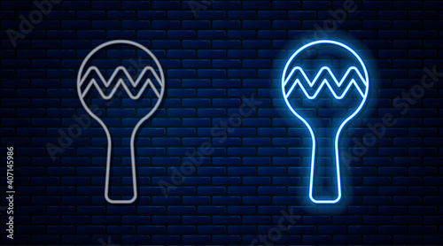 Glowing neon line Maracas icon isolated on brick wall background. Music maracas instrument mexico. Vector.
