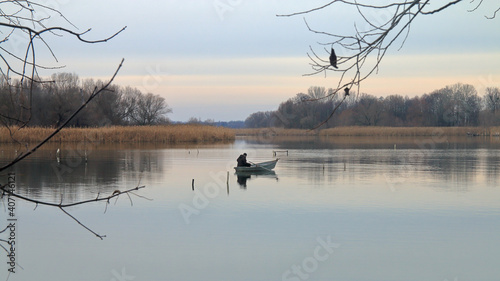 Morning fishing on a quiet river in the autumn.