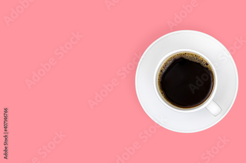 White cups with coffee on a bright colored background.