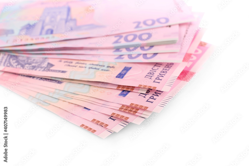 200 Ukrainian Hryvnia banknotes on white background, closeup 200 Ukrainian Hryvnia banknotes on white background, closeup
