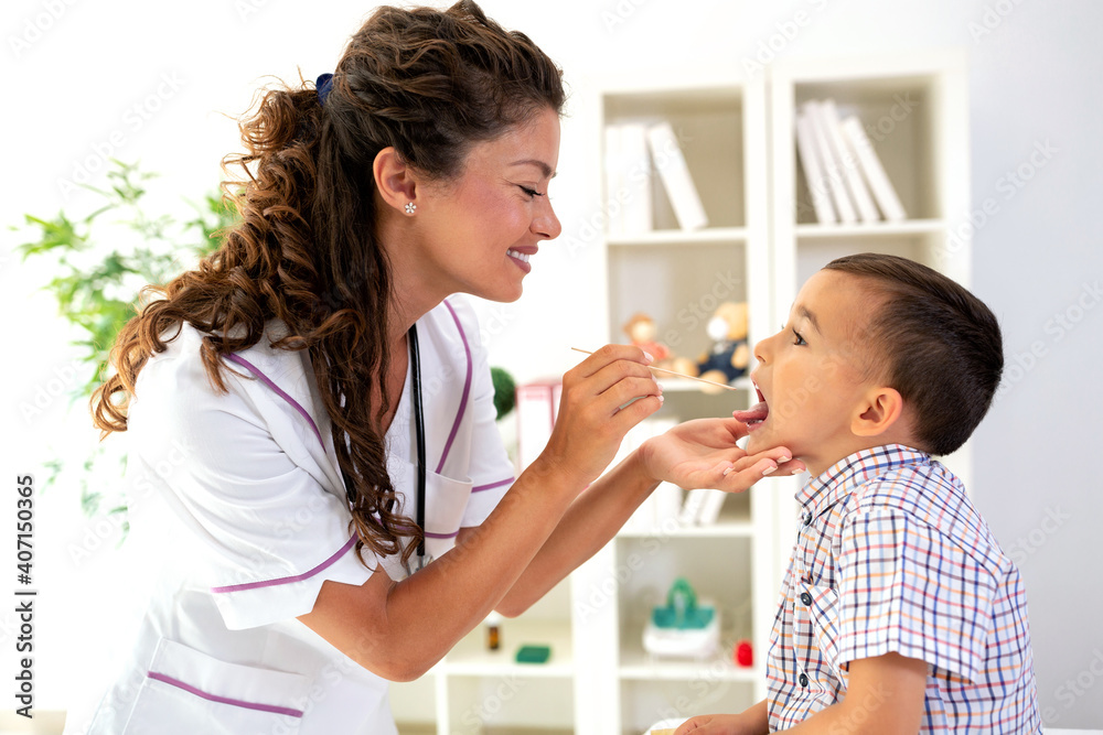 Throat examination of a cute little boy