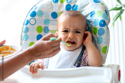 Crying baby refusing to eat
