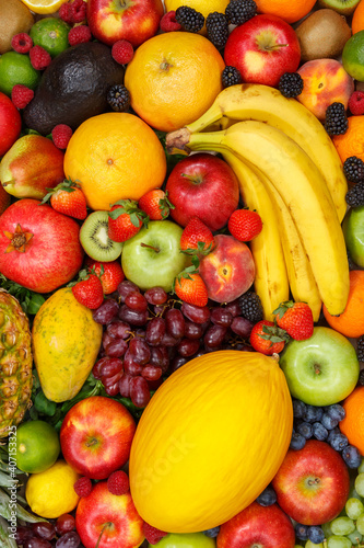 Fototapeta Naklejka Na Ścianę i Meble -  Food background fruits collection apples berries portrait format banana oranges fruit