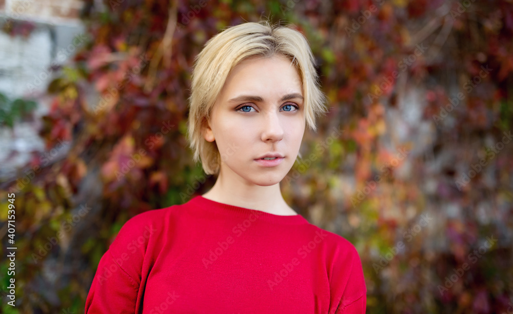 Outdoors portrait of beautiful young woman. Selective focus. Outdoors portrait of beautiful young woman. Selective focus.