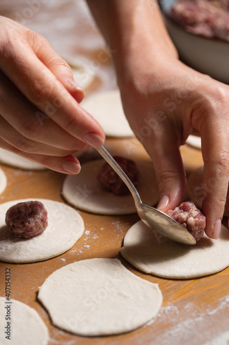 Cuadro en lienzo Dumplings making process, dough and minced meat