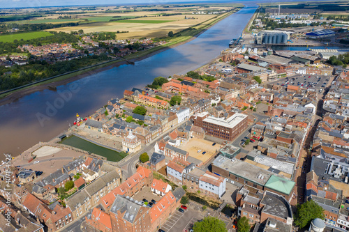 Aerial photo of the beautiful town of King's Lynn a seaport and market town in Norfolk, England UK showing the main town centre along side the River Great Ouse on a sunny summers day