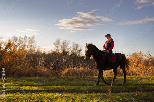  Girl riding a horse © Dusan Kostic