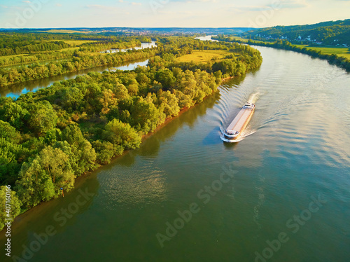 Scenic aerial view of the Seine river and green fields in French countryside photo