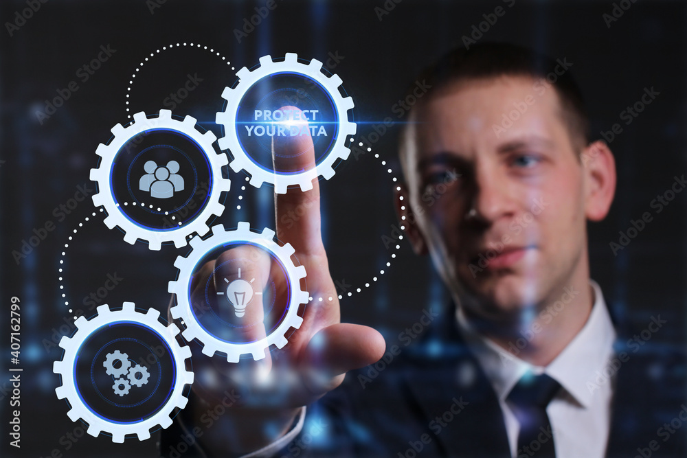 Business, Technology, Internet and network concept. Young businessman working on a virtual screen of the future and sees the inscription: Protect your data Business, Technology, Internet and network concept. Young businessman working on a virtual screen of the future and sees the inscription: Protect your data
