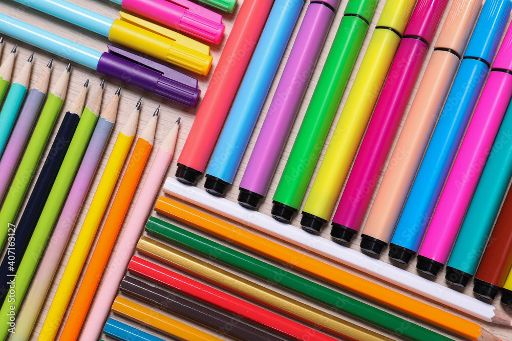 Different school stationery on wooden table, flat lay Different school stationery on wooden table, flat lay