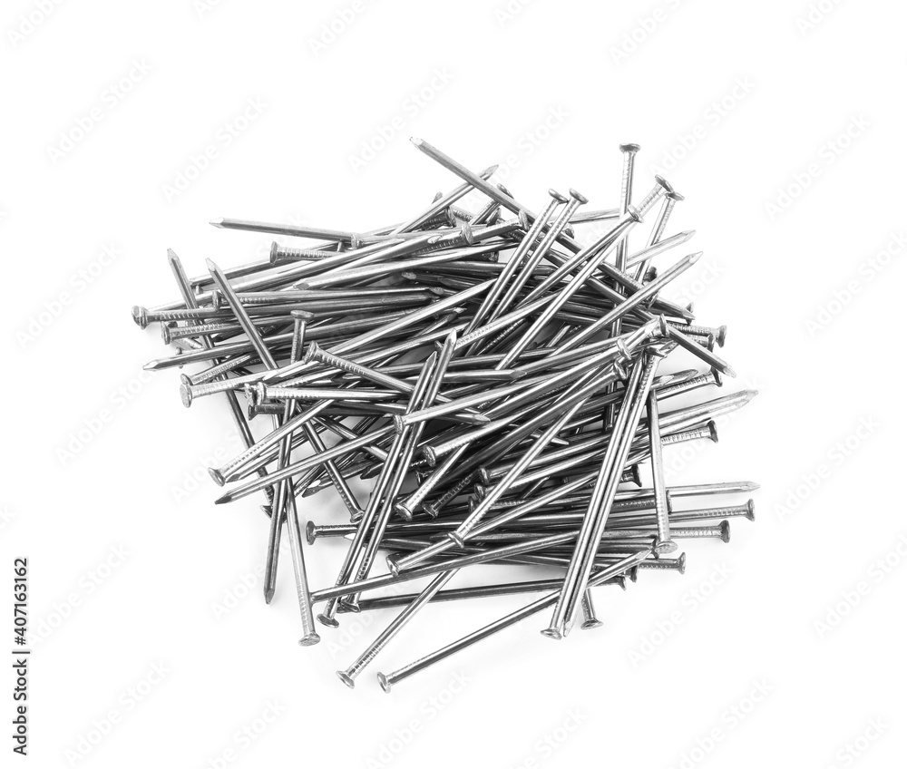 Pile of metal nails on white background, top view