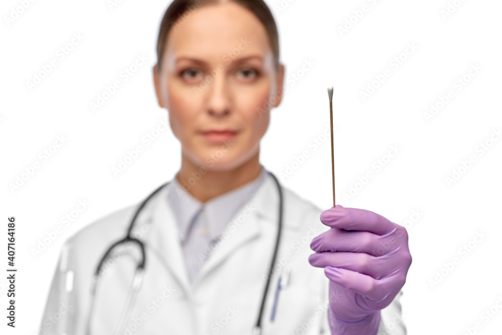 medicine, health and coronavirus concept - close up of female doctor with cotton swab medicine, health and coronavirus concept - close up of female doctor with cotton swab