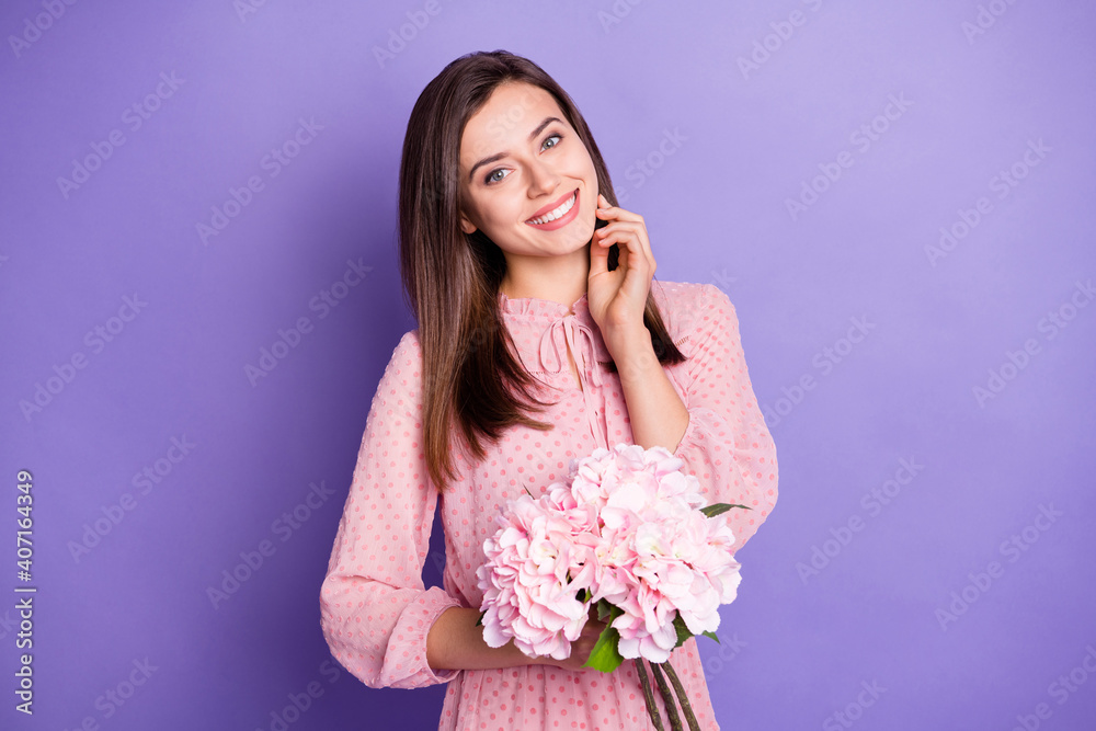 Portrait of attractive lady arm fingers touch cheek hold flowers wear vintage outfit isolated on magenta color background Portrait of attractive lady arm fingers touch cheek hold flowers wear vintage outfit isolated on magenta color background