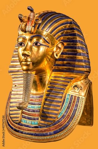 Funeral mask of pharoah Tutankhamun on yellow background