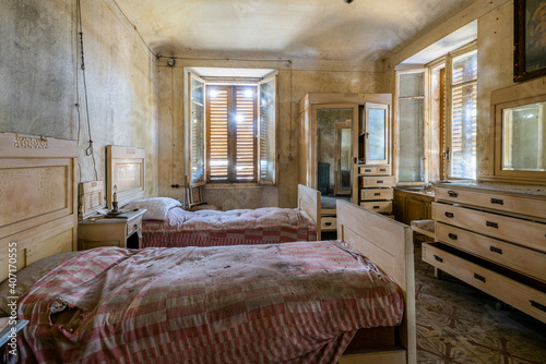 Italy, January 20, 2021. Bedroom in an abandoned country villa