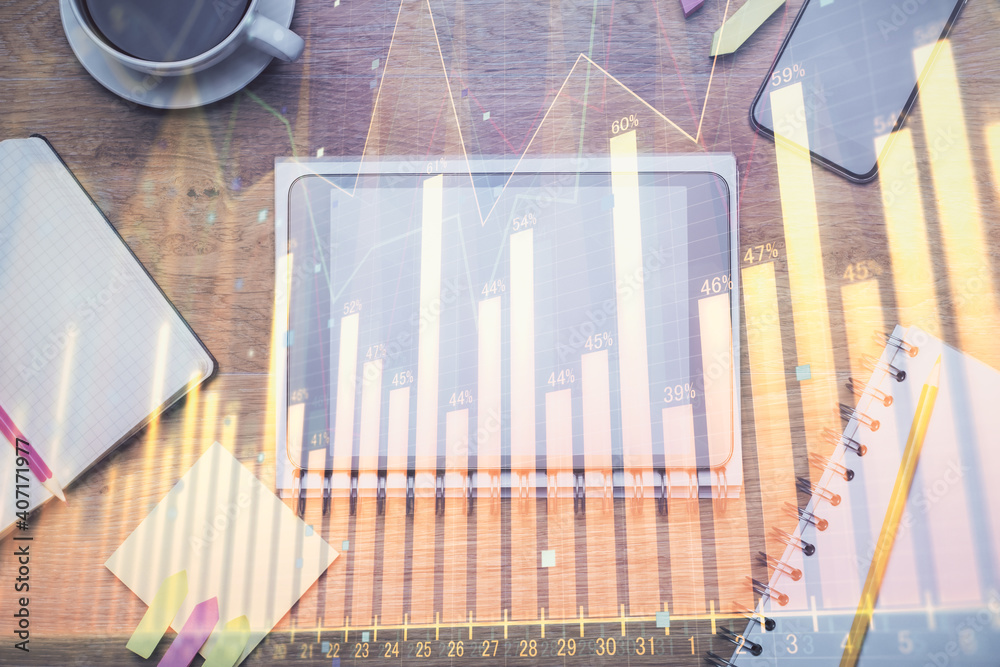 Double exposure of forex chart hologram over desktop with phone. Top view. Mobile trade platform concept. Double exposure of forex chart hologram over desktop with phone. Top view. Mobile trade platform concept.
