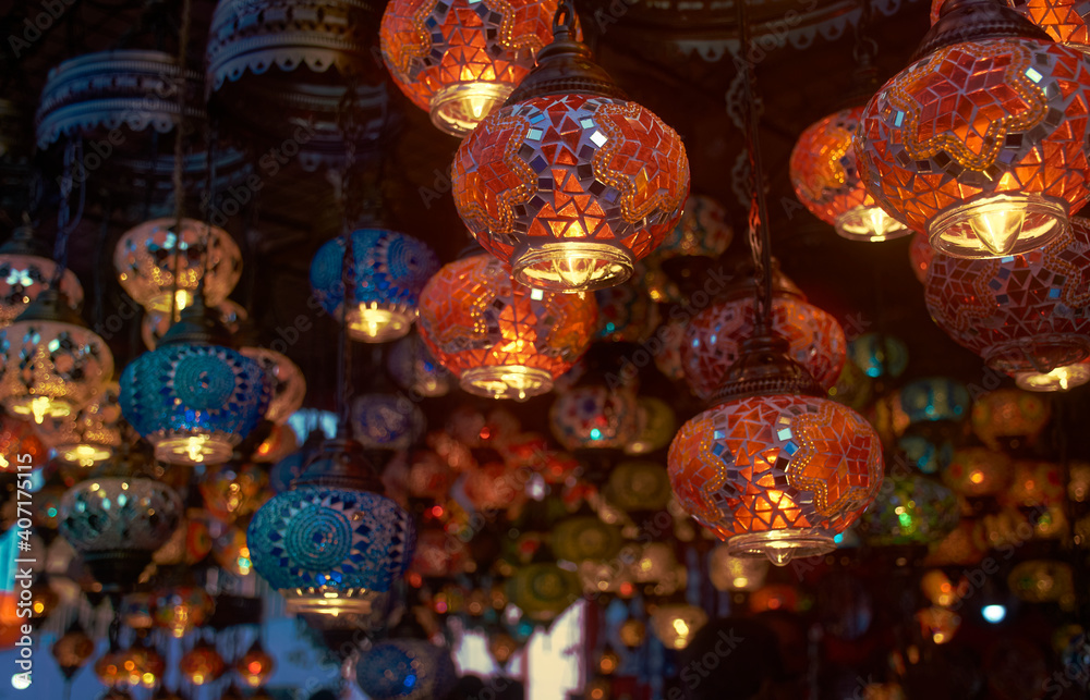 Beautiful vibrant coloured traditional Persian / Moroccan lanterns hanging in a craft-fair in West Bengal, Kolkata. Selective focus used.
