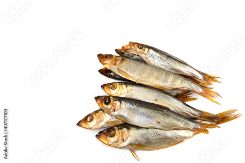 Herring.Delicious hot-smoked Baltic herring on a white isolated background, selective focus.Space for the text . photo