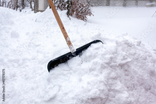 Snow shovel in a snowdrift