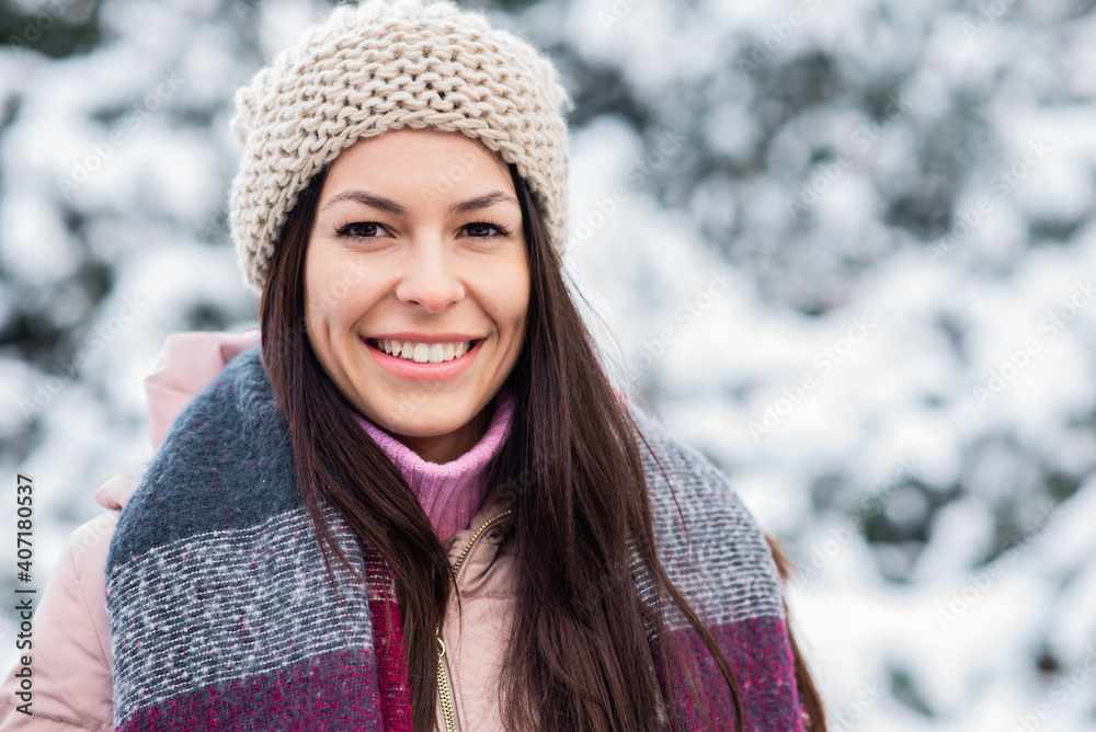 Beautiful smiling young woman in wintertime outdoor. Winter concept Beautiful smiling young woman in wintertime outdoor. Winter concept