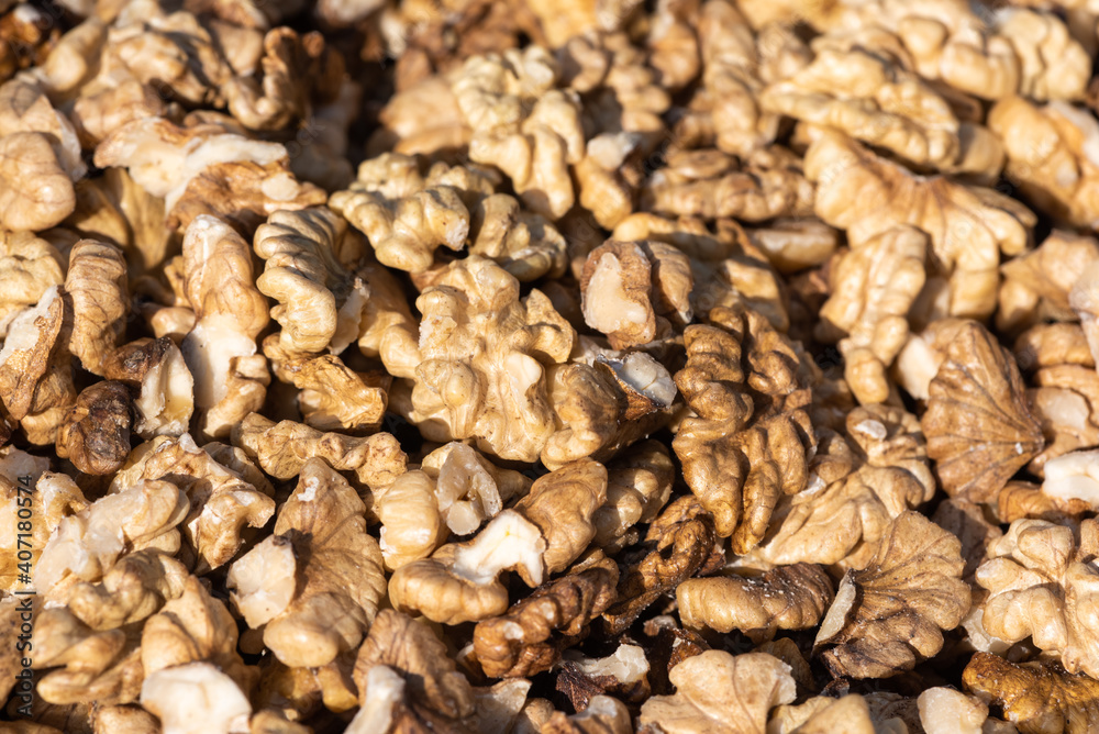Heap of open walnuts on a market stall in Chengdu, Sichuan province, China Heap of open walnuts on a market stall in Chengdu, Sichuan province, China