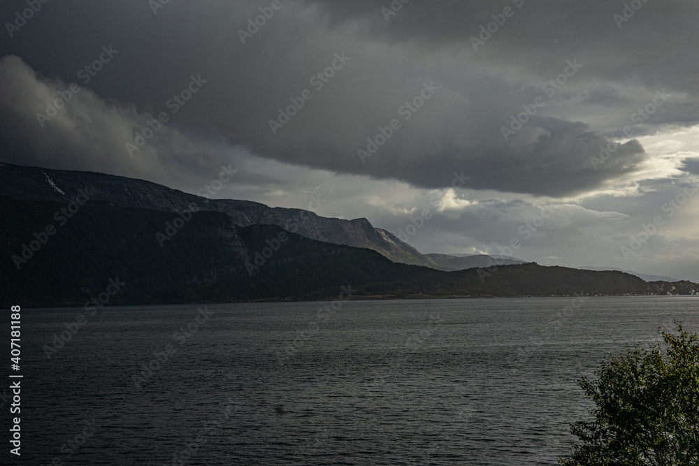 Mountains with clouds around it in Norway