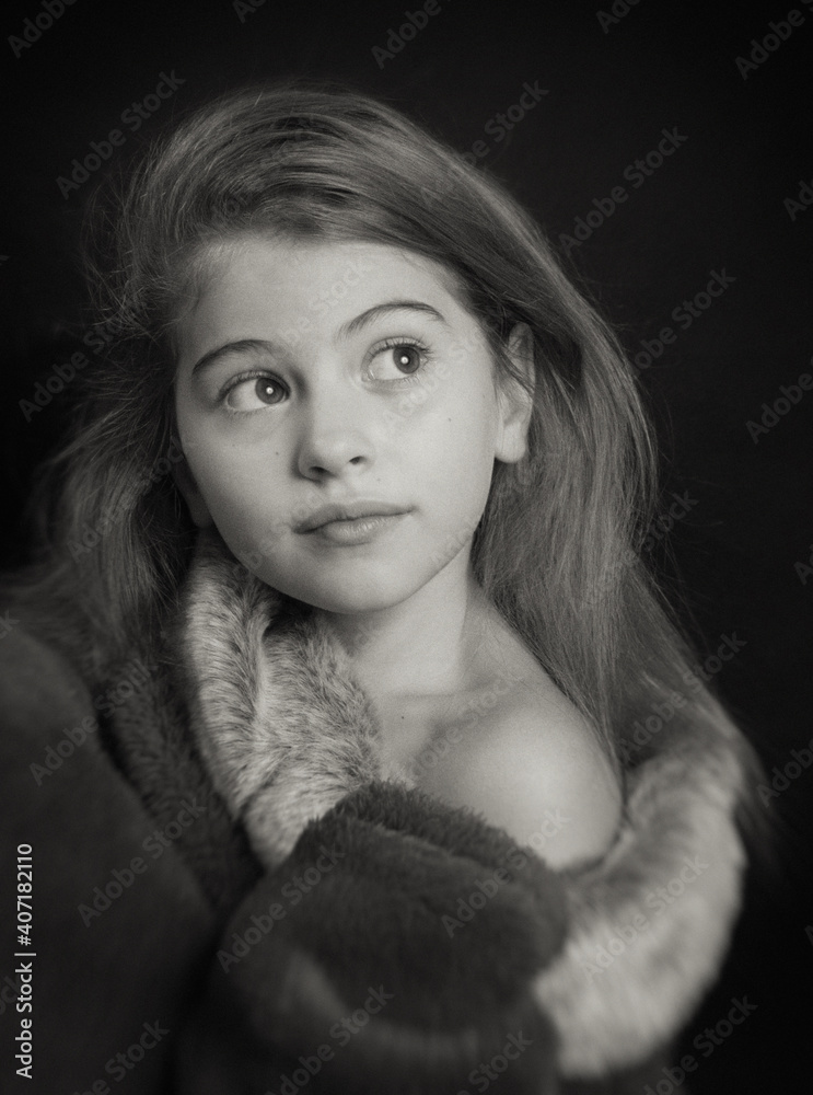 Portrait of a teenage girl in a coat with a fur collar. Portrait of a teenage girl in a coat with a fur collar.