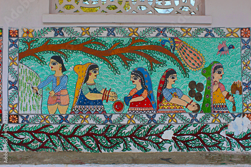 Madhubani painting or Mithila paintings on wall of Mithila University, Darbhanga, Bihar, India. Mostly depict people and their association with nature and scenes and deities from the ancient epics photo