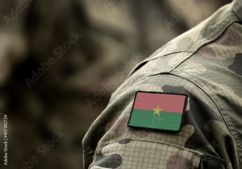 Flag of Burkina Faso on military uniform. Army, troops, soldiers, Africa, (collage). photo