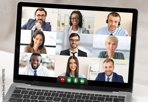 Closeup Of Laptop Screen With Business People Having Online Meeting photo