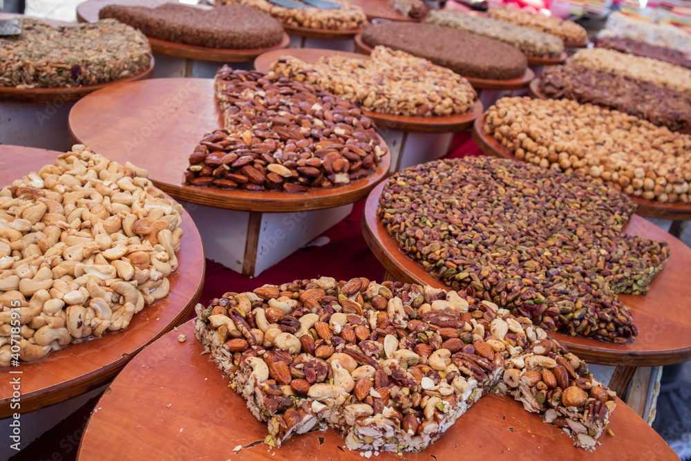 A lot of oriental nut sweets at  a street market 