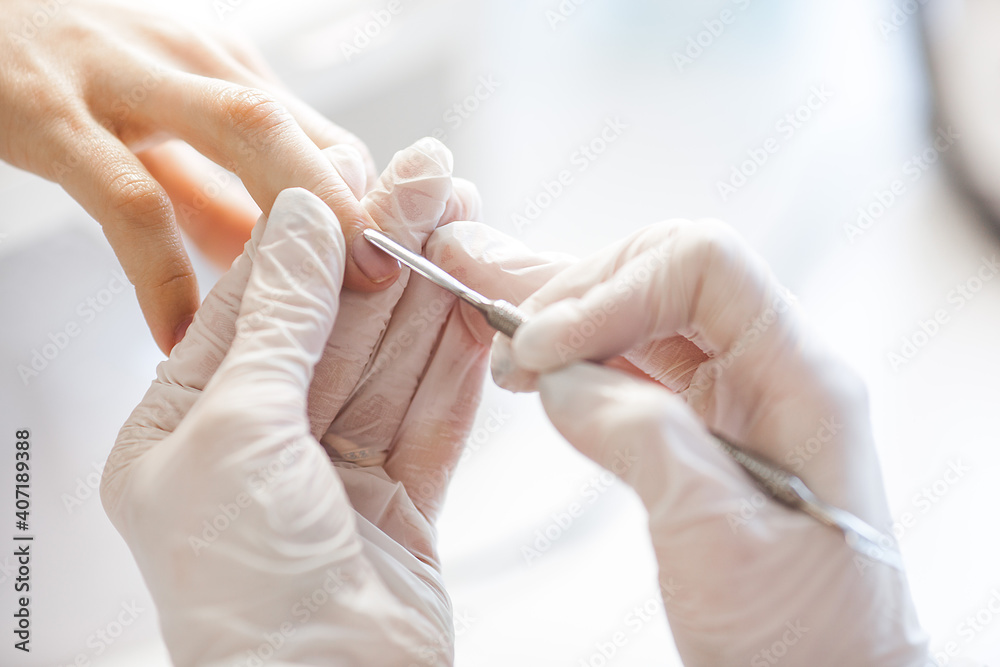 manicure in beauty salon. woman doing manicure manicure in beauty salon. woman doing manicure