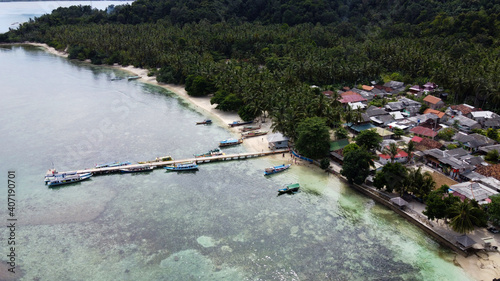 Pier with at Lampung Sea Pahawang Beach, located near the Sumatera city aerial drone. Resort Pahawang With a clouds on the Sky in a day.  photo