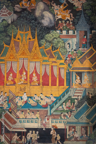 Ancient famous Thai mural wall paintings attached at building along inner wall around chapel portrays story of Buddhist history at Wat Pho temple, Bangkok, Thailand. © pomphotothailand