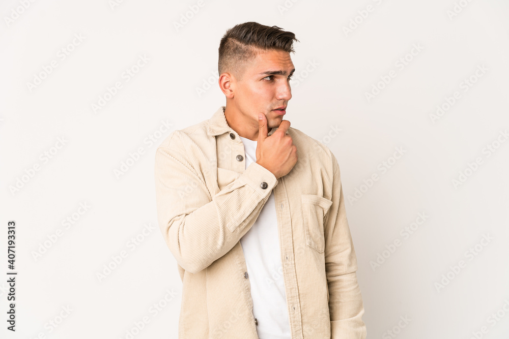 Young caucasian handsome man isolated suffers pain in throat due a virus or infection. Young caucasian handsome man isolated suffers pain in throat due a virus or infection.