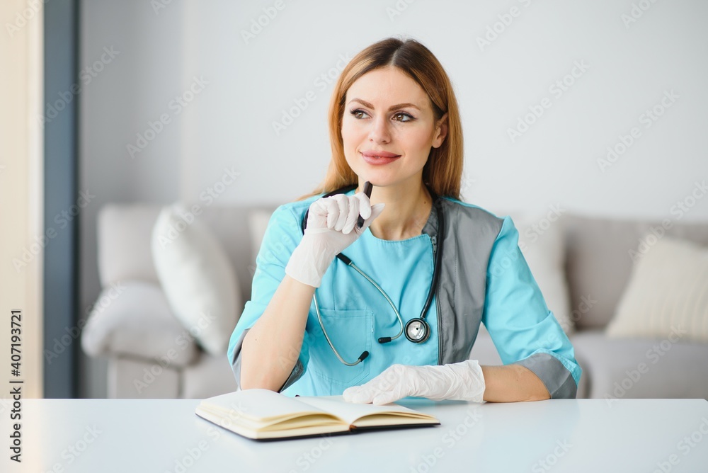 Portrait of young female doctor at workplace Portrait of young female doctor at workplace