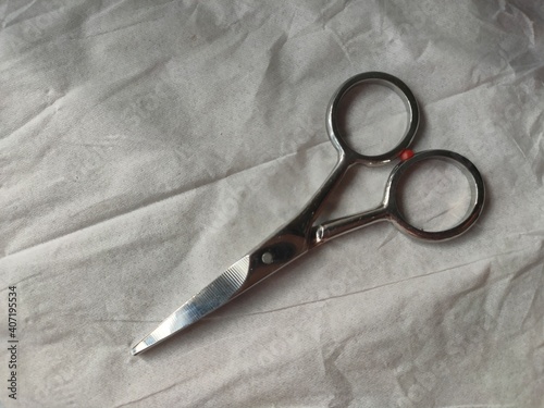 a steel scissors in a white backgorund