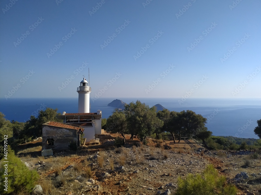 Gelidonya Lighthouse at cape in Mediterranean sea. Lighthouse and three Islands on Lycian Way in. Karaoz, Antalya, Turkey