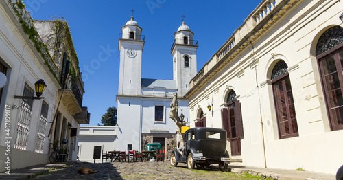 Obsolete cars, in front of the church of Colonia del Sacramento, Uruguay. It is one of the oldest cities in Uruguay. #407199187